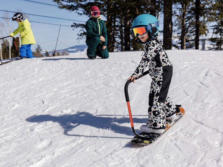 Initiation Snowboard Enfant avec Barre d'Appui | Burton.com